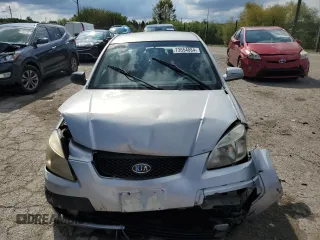 2007 Kia Rio LX with VIN KNADE123776231384, listed as a Copart auction lot 73554084 with 0 mi miles and Salvage Title. Bid and sale history available at carsss.com. Image 5.