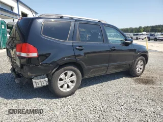 2009 Kia Borrego LX with VIN KNDJJ741395020692, listed as a Copart auction lot 52730975 with 217,861 mi miles and Salvage Title. Bid and sale history available at carsss.com. Image 3.