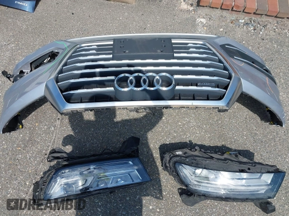 2018 Audi Q7 Premium Plus with VIN WA1LHAF74JD015170, listed as a IAAI auction lot 42542451 with 104,990 mi miles and . Bid and sale history available at DreamBid. Image 18.