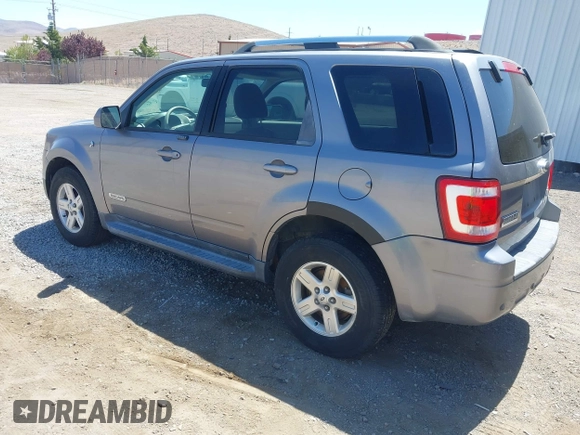 2008 Ford Escape Hybrid with VIN 1FMCU59H28KB77877, listed as a IAAI auction lot 42538747 with 305,353 mi miles and . Bid and sale history available at DreamBid. Image 3.