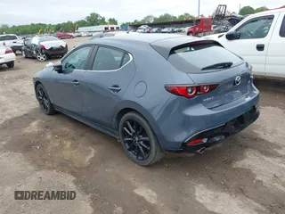 2023 Mazda 3 S Preferred z VIN JM1BPALM9P1623663, wystawiony jako IAAI lot #42341379 z przebiegiem 31 848 mil mil oraz . Historia ofert i sprzedaży dostępna na DreamBid. Obrazek 3.
