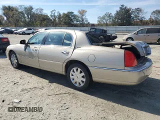 2004 Lincoln Town Car Ultimate L z VIN 1LNHM85W94Y672371, wystawiony jako Copart lot #77752284 z przebiegiem 140 776 mil mil oraz Nie do naprawy • Non repairable. Historia ofert i sprzedaży dostępna na DreamBid. Obrazek 2.