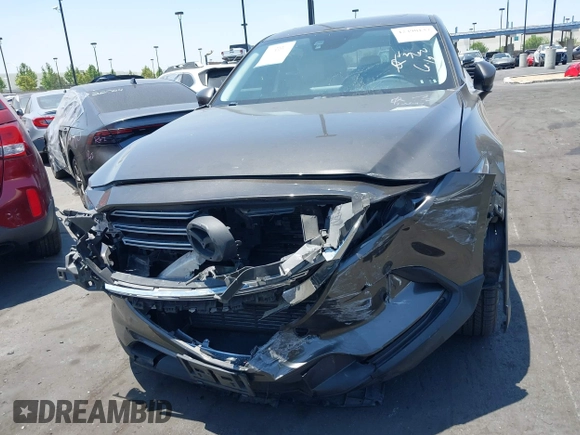 2017 Mazda CX-9 Touring with VIN JM3TCBCY1H0131233, listed as a IAAI auction lot 42490137 with 84,216 mi miles and . Bid and sale history available at DreamBid. Image 12.