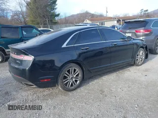 2016 Lincoln MKZ with VIN 3LN6L2G93GR624043, listed as a IAAI auction lot 41446081 with 124,680 mi miles and . Bid and sale history available at DreamBid. Image 4.