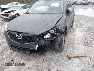 2015 Mazda CX-5 Touring with VIN JM3KE2CY4F0435563, listed as a IAAI auction lot 41311988 with 187,183 mi miles. Bid and sale history available at carsss.com. Image 6.