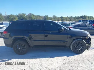 2018 Jeep Grand Cherokee Laredo E with VIN 1C4RJEAG0JC168721, listed as a IAAI auction lot 41162675 with 191,820 mi miles. Bid and sale history available at carsss.com. Image 13.
