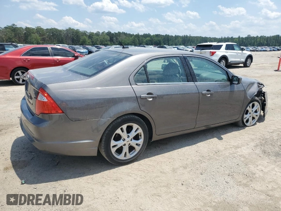 2012 Ford Fusion SE z VIN 3FAHP0HA0CR328833, wystawiony jako Copart lot #57631955 z przebiegiem 94 613 mil mil oraz Szkoda całkowita • Salvage title. Historia ofert i sprzedaży dostępna na DreamBid. Obrazek 3.