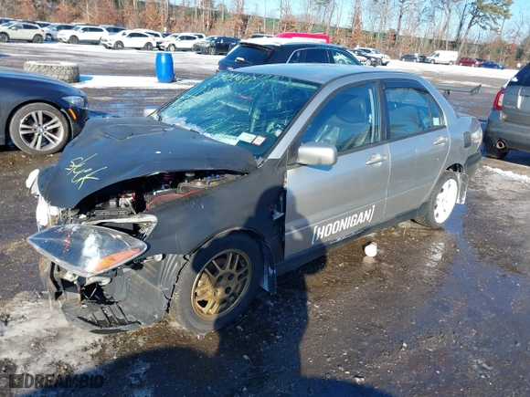 2006 Mitsubishi Lancer OZ-Rally with VIN JA3AJ86E56U000207, listed as a IAAI auction lot 41401698 with 239,219 mi miles. Bid and sale history available at carsss.com. Image 2.