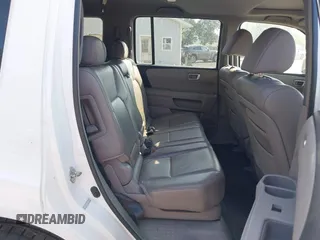 2009 Honda Pilot EX-L with VIN 5FNYF48569B039103, listed as a IAAI auction lot 42651867 with 162,450 mi miles and . Bid and sale history available at DreamBid. Image 8.