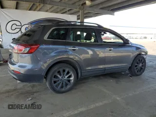 2015 Mazda CX-9 Grand Touring z VIN JM3TB3DV2F0456130, wystawiony jako Copart lot #55787935 z przebiegiem 120 888 mil mil oraz Szkoda całkowita • Salvage title. Historia ofert i sprzedaży dostępna na DreamBid. Obrazek 3.