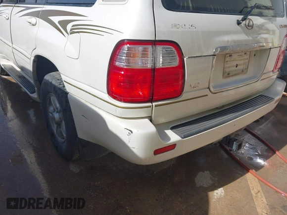2000 Lexus LX 470 with VIN JT6HT00W5Y0080249, listed as a IAAI auction lot 41726247 with 315,707 mi miles and . Bid and sale history available at carsss.com. Image 6.