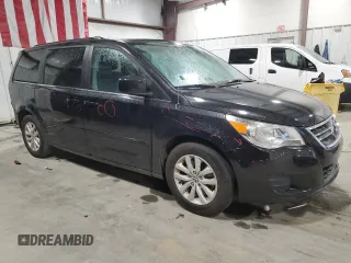 2014 Volkswagen Routan SE with VIN 2C4RVABG1ER134618, listed as a Copart auction lot 81744564 with 121,136 mi miles and Salvage title. Bid and sale history available at DreamBid. Image 4.