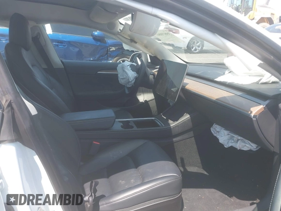 2023 Tesla Model 3 with VIN 5YJ3E1EA6PF460054, listed as a IAAI auction lot 41231368 with 29,437 mi miles and . Bid and sale history available at DreamBid. Image 5.