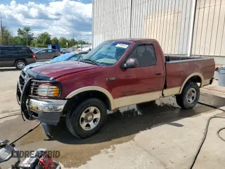 1999 Ford F-150 with VIN 1FTZF1828XNA91078, listed as a Copart auction lot 72164614 with Not provided miles and Salvage title. Bid and sale history available at DreamBid. Image 1.