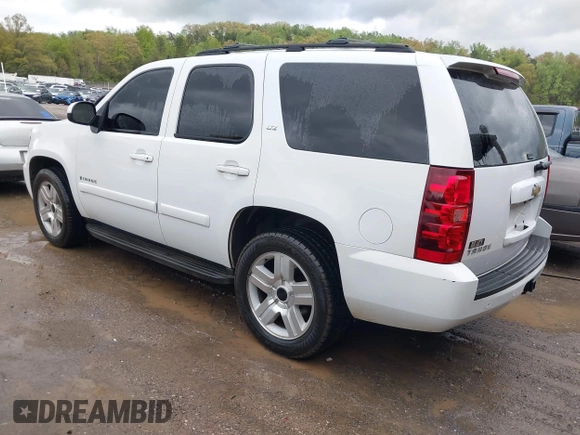 2007 Chevrolet Tahoe LT z VIN 1GNFC13J37R113756, wystawiony jako IAAI lot #42021634 z przebiegiem 247 631 mil mil oraz . Historia ofert i sprzedaży dostępna na DreamBid. Obrazek 3.