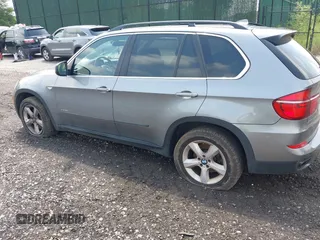 2013 BMW X5 xDrive50i with VIN 5UXZV8C58D0C16717, listed as a IAAI auction lot 42627144 with 165,724 mi miles and . Bid and sale history available at DreamBid. Image 3.