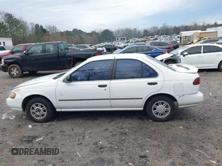 1996 Nissan Sentra XE z VIN 1N4AB41D0TC763104, wystawiony jako IAAI lot #41303640 z przebiegiem 307 682 mil mil oraz . Historia ofert i sprzedaży dostępna na DreamBid. Obrazek 14.