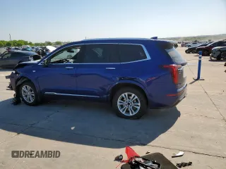 2023 Cadillac XT6 FWD Luxury z VIN 1GYKPAR42PZ167668, wystawiony jako Copart lot #53278075 z przebiegiem 32 212 mil mil oraz Szkoda całkowita • Salvage title. Historia ofert i sprzedaży dostępna na DreamBid. Obrazek 2.