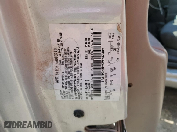 2005 Ford Focus S with VIN 1FAFP34N95W247489, listed as a Copart auction lot 60858415 with Not provided miles and Salvage title. Bid and sale history available at DreamBid. Image 12.