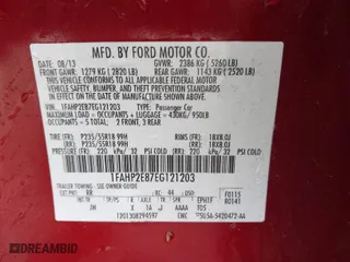 2014 Ford Taurus SEL with VIN 1FAHP2E87EG121203, listed as a IAAI auction lot 41908069 with 140,451 mi miles. Bid and sale history available at carsss.com. Image 9.