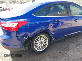 2012 Ford Focus SEL with VIN 1FAHP3H25CL283610, listed as a IAAI auction lot 41973385 with 160,732 mi miles. Bid and sale history available at carsss.com. Image 6.