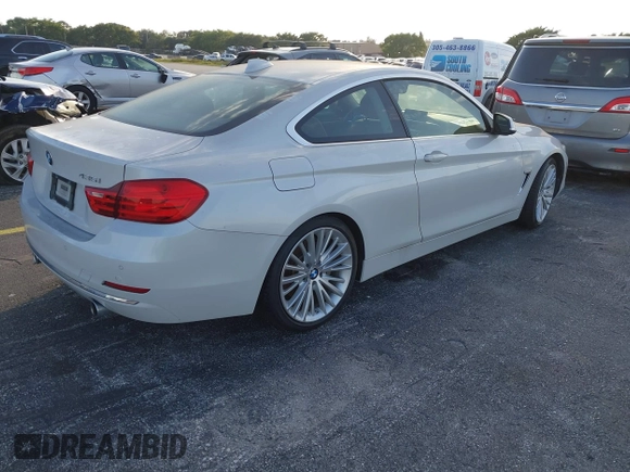 2014 BMW 4 Series 435i with VIN WBA3R1C51EK192795, listed as a IAAI auction lot 41263037 with 22,937 mi miles and . Bid and sale history available at DreamBid. Image 4.