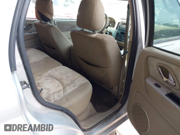2006 Mercury Mariner Convenience with VIN 4M2YU56Z86KJ12563, listed as a IAAI auction lot 41817401 with 152,156 mi miles and . Bid and sale history available at DreamBid. Image 8.