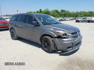 2013 Dodge Journey American Value z VIN 3C4PDCAB5DT509370, wystawiony jako IAAI lot #42066389 z przebiegiem 159 811 mil mil oraz . Historia ofert i sprzedaży dostępna na DreamBid. Obrazek 1.