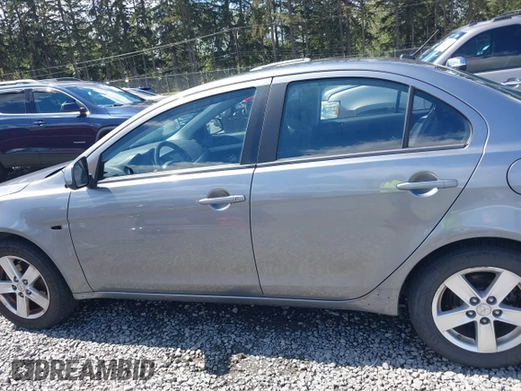 2014 Mitsubishi Lancer SE with VIN JA32V2FWXEU001902, listed as a IAAI auction lot 42116913 with 117,335 mi miles and . Bid and sale history available at carsss.com. Image 15.