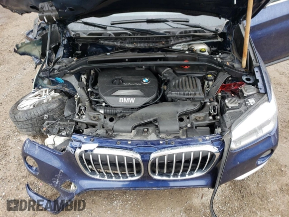 2018 BMW X1 xDrive28i with VIN WBXHT3C35J5F88893, listed as a Copart auction lot 58032725 with 143,968 mi miles and Salvage title. Bid and sale history available at DreamBid. Image 12.