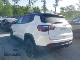2021 Jeep Compass Altitude with VIN 3C4NJDBB2MT596181, listed as a IAAI auction lot 42026716 with 69,526 mi miles and . Bid and sale history available at DreamBid. Image 3.