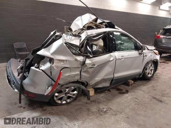 2016 Ford Escape Titanium with VIN 1FMCU9J94GUB00815, listed as a IAAI auction lot 40893687 with 152,891 mi miles. Bid and sale history available at carsss.com. Image 4.