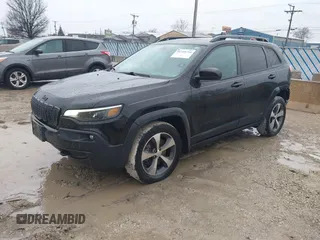 2020 Jeep Cherokee Latitude with VIN 1C4PJMCX9LD584410, listed as a IAAI auction lot 41710754 with 73,325 mi miles. Bid and sale history available at carsss.com. Image 2.