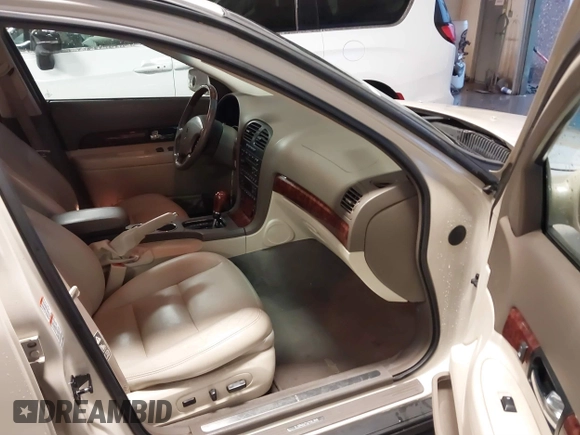 2002 Lincoln LS w/Base Pkg z VIN 1LNHM87AX2Y620293, wystawiony jako IAAI lot #41461349 z przebiegiem 129 295 mil mil oraz . Historia ofert i sprzedaży dostępna na DreamBid. Obrazek 5.