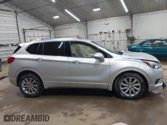 2019 Buick Envision Essence with VIN LRBFXCSA3KD119247, listed as a IAAI auction lot 42001735 with 51,566 mi miles and . Bid and sale history available at carsss.com. Image 13.