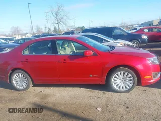 2011 Ford Fusion Hybrid with VIN 3FADP0L3XBR342051, listed as a IAAI auction lot 41880330 with 118,776 mi miles and . Bid and sale history available at DreamBid. Image 13.