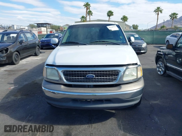 2003 Ford F-150 XLT with VIN 1FTRW07L23KA82084, listed as a IAAI auction lot 42140764 with 286,754 mi miles. Bid and sale history available at carsss.com. Image 6.