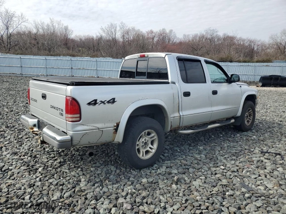 2004 Dodge Dakota SLT with VIN 1D7HG48NX4S677465, listed as a Copart auction lot 51044735 with 196,854 mi miles and Clean Title. Bid and sale history available at carsss.com. Image 3.