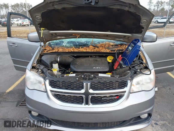 2017 Dodge Grand Caravan SXT with VIN 2C4RDGCG9HR677157, listed as a IAAI auction lot 41470342 with 66,611 mi miles and . Bid and sale history available at DreamBid. Image 10.
