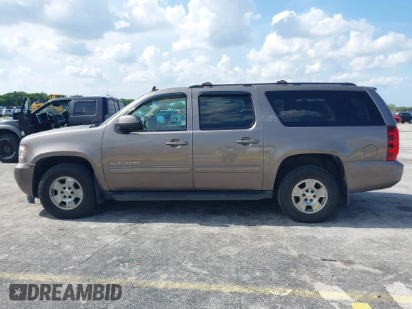 2012 Chevrolet Suburban LT with VIN 1GNSKJE72CR130111, listed as a IAAI auction lot 42699365 with 216,827 mi miles and . Bid and sale history available at DreamBid. Image 14.