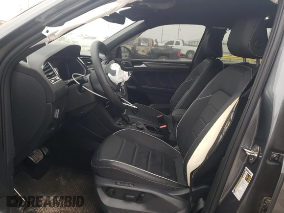 2024 Volkswagen Tiguan SEL R-Line with VIN 3VV4B7AX7RM158394, listed as a Copart auction lot 51044755 with 5,566 mi miles and Salvage title. Bid and sale history available at DreamBid. Image 7.