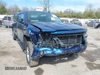 2017 Chevrolet Silverado 1500 LT with VIN 3GCUKREC5HG363503, listed as a IAAI auction lot 41833304 with 133,130 mi miles and . Bid and sale history available at DreamBid. Image 1.