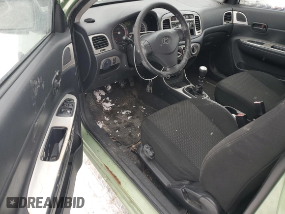 2009 Hyundai Accent Man L with VIN KMHCN35CX9U125639, listed as a Copart auction lot 42422965 with 325,113 mi miles and Clean Title. Bid and sale history available at carsss.com. Image 8.