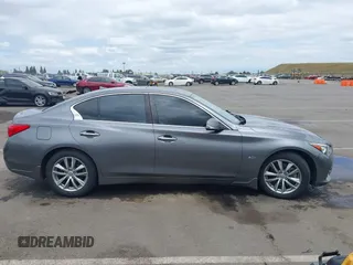 2016 Infiniti Q50 Sport z VIN JN1EV7AP0GM301238, wystawiony jako IAAI lot #42132037 z przebiegiem 134 332 mil mil oraz . Historia ofert i sprzedaży dostępna na DreamBid. Obrazek 14.