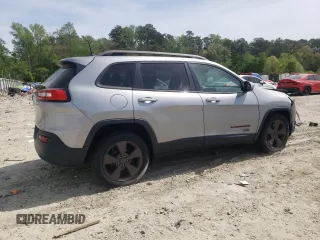 2016 Jeep Cherokee 75th Anniversary with VIN 1C4PJLCB5GW256619, listed as a Copart auction lot 53648575 with 98,969 mi miles and Salvage Title. Bid and sale history available at DreamBid. Image 3.