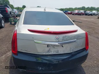2014 Cadillac XTS Luxury z VIN 2G61M5S38E9291182, wystawiony jako IAAI lot #42495838 z przebiegiem 104 941 mil mil oraz . Historia ofert i sprzedaży dostępna na DreamBid. Obrazek 16.