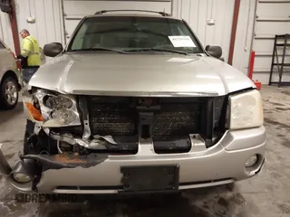 2005 GMC Envoy SLE with VIN 1GKET16S656102522, listed as a IAAI auction lot 41729310 with 233,049 mi miles. Bid and sale history available at carsss.com. Image 13.