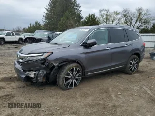 2020 Honda Pilot Touring 7-Passenger z VIN 5FNYF6H69LB005829, wystawiony jako Copart lot #52702555 z przebiegiem 90 746 mil mil oraz Szkoda całkowita • Salvage title. Historia ofert i sprzedaży dostępna na DreamBid. Obrazek 1.