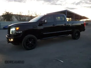 2018 Nissan Titan XD PRO-4X with VIN 1N6BA1F48JN521832, listed as a Copart auction lot 82158304 with 120,768 mi miles and Salvage Title. Bid and sale history available at carsss.com. Image 1.