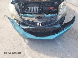 2013 Honda Fit Sport z VIN JHMGE8H50DC006995, wystawiony jako Copart lot #58854875 z przebiegiem 78 207 mil mil oraz Szkoda całkowita • Salvage title. Historia ofert i sprzedaży dostępna na DreamBid. Obrazek 12.